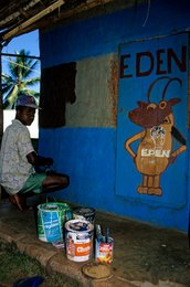 Comoros-Archipelago;-France;-Indian-Ocean;-Inscription;-Kaleidos;-Kaleidos-images;-La-parole-à-limage;-Laurent-Abad;-Mayotte;-Paint;-Painted-wall;-Portrait;-Stories-Pictures;-Young-man;-Zebu